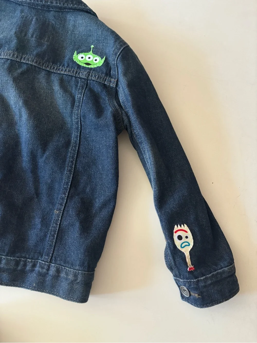 Boys Dark Blue Denim Jacket with hand sewn on Toy Story Patches